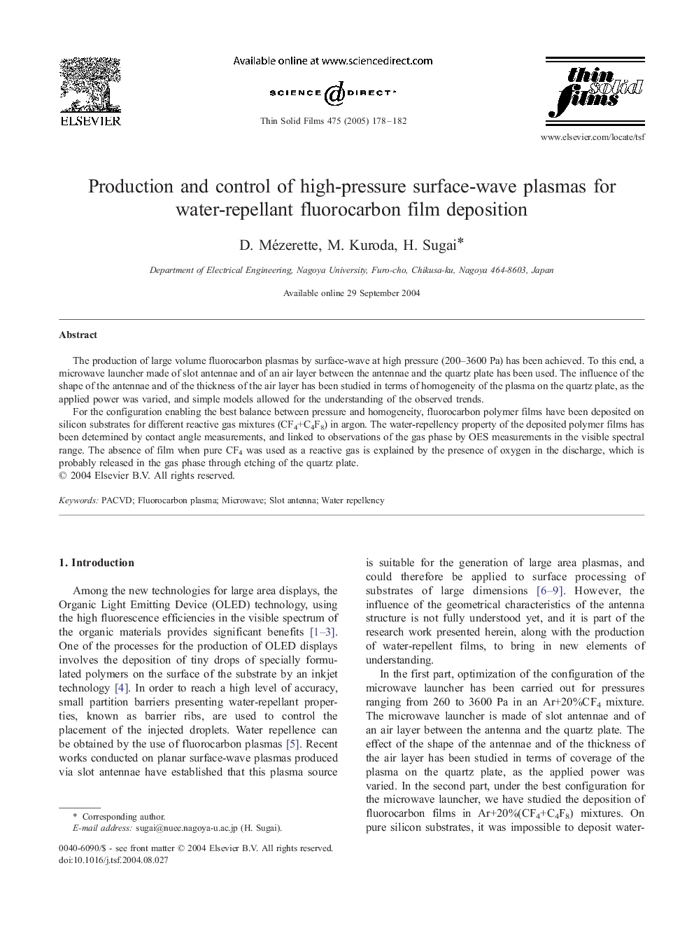 Production and control of high-pressure surface-wave plasmas for water-repellant fluorocarbon film deposition