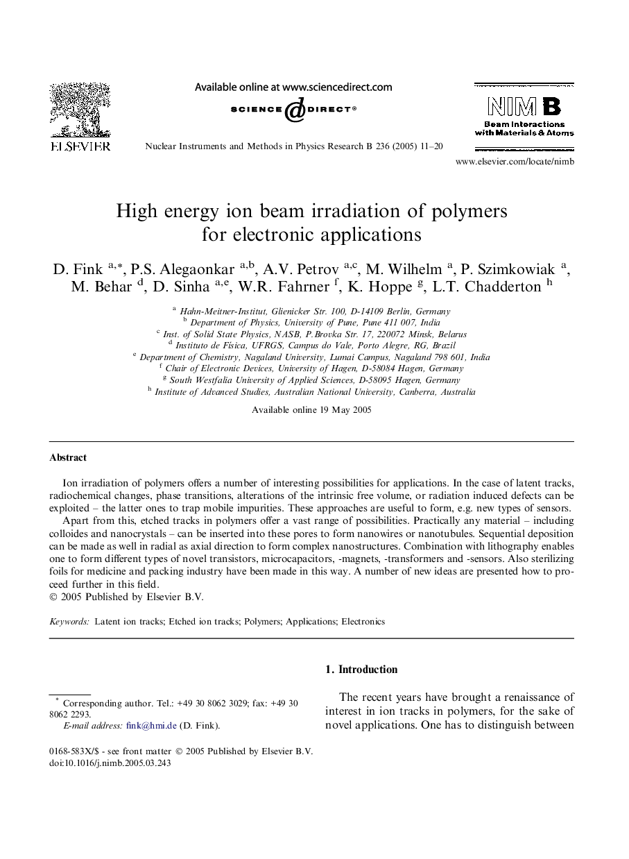 High energy ion beam irradiation of polymers for electronic applications