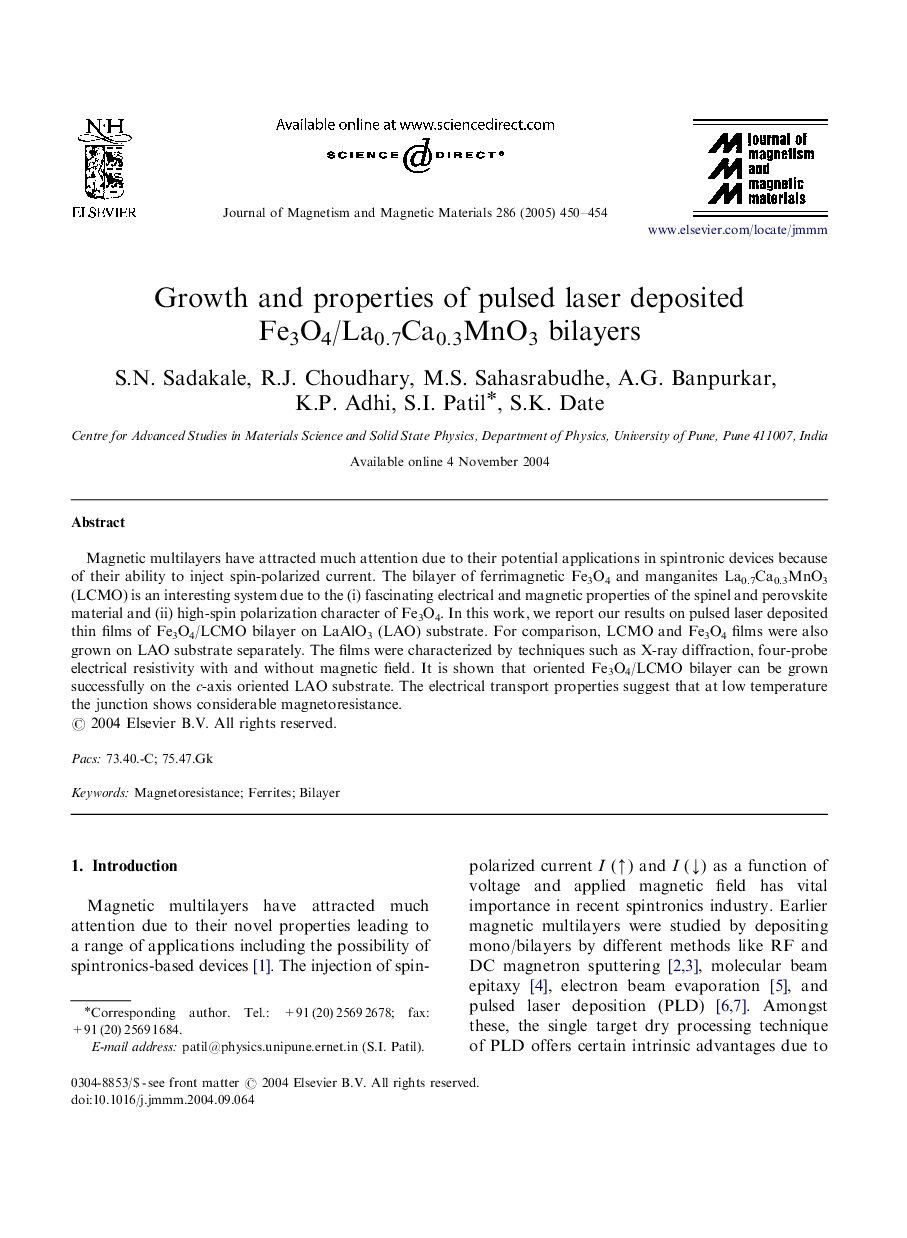 Growth and properties of pulsed laser deposited Fe3O4/La0.7Ca0.3MnO3 bilayers