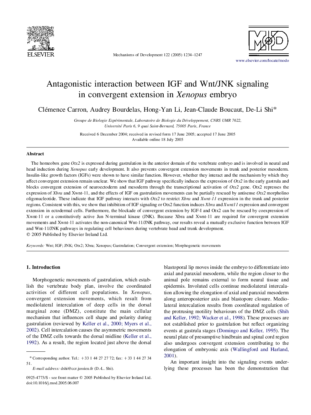 Antagonistic interaction between IGF and Wnt/JNK signaling in convergent extension in Xenopus embryo