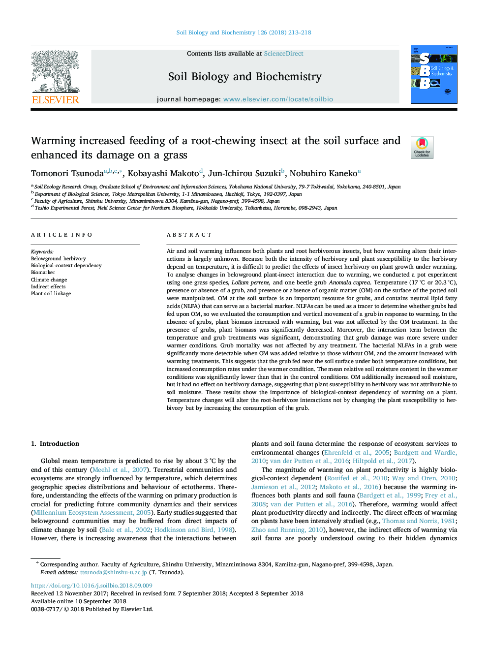 Warming increased feeding of a root-chewing insect at the soil surface and enhanced its damage on a grass